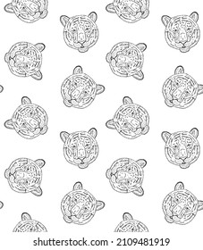 Vector seamless pattern of hand drawn doodle sketch tiger heads isolated on white background