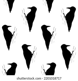 Vector seamless pattern of hand drawn colored woodpecker bird silhouette isolated on white background
