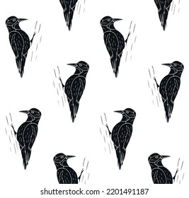 Vector seamless pattern of hand drawn woodpecker bird isolated on white background