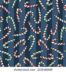 Vector seamless pattern with hand drawn candy canes on striped background. Cute design for Christmas wrapping paper and textile.