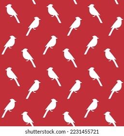 Vector seamless pattern of hand drawn blue jay bird silhouette isolated on red background