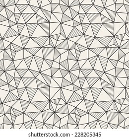 Vector seamless pattern. Hand drawn repeating texture with linear triangles. The alternation of empty and striped triangles