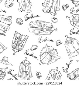 Vector seamless pattern with hand drawn, fashionable outerwear and headgear on white background. Background for use in design, web site, packing, textile, fabric