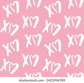 Vector seamless pattern of hand drawn doodle sketch xoxo lettering with heart isolated on pink background