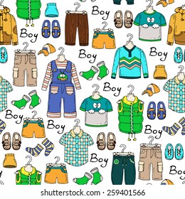 Vector seamless pattern with hand drawn and fashionable clothes for little boys on white color. Background for use in design, web site, packing, textile, fabric