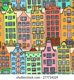 Vector seamless pattern with hand drawn colorful european houses. 