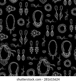 Vector seamless pattern of hand drawn fashionable jewelry for women on black background. Necklaces, earrings, brooches and bracelets. Background for use in design, web site, packing, textile, fabric