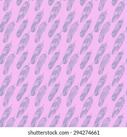 Vector seamless pattern with hand drawn doodle feathers.