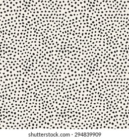 Vector seamless pattern. Hand drawn polka dot texture. Stylish monochrome doodles. Modern graphic design. Hipster creative tileable print.