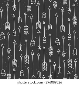 Vector seamless pattern with hand drawn arrows on black background. Scandinavian style texture. Good for wedding invitation, birthday card, wallpaper, fabric print, interior surface, wrapping paper