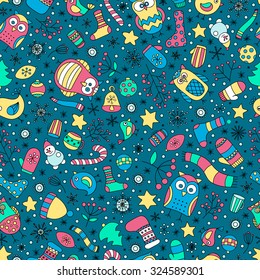 Vector seamless pattern with hand drawn doodle winter elements. Christmas funny colorful pattern. Owls, birds, stars, mittens, snowflakes and socks.