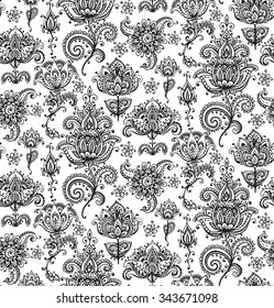 Vector seamless pattern with hand drawn henna mehndi floral elements.