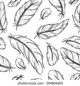 Vector seamless pattern of hand drawn feather. Ink feather vintage illustration. Detailed drawing in boho style. Great for rustic wedding decor.