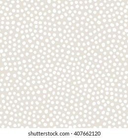 Vector seamless pattern. Hand drawn polka dot texture. Stylish subtle doodles. Modern graphic design. Hipster creative tileable print.