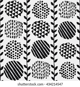 Vector seamless pattern of  hand drawn vintage floral elements. Leaves, brunches, ornamental decorative spots elements in ink