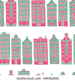 Vector seamless pattern with hand drawn colorful european houses. Beautiful design elements, perfect for Christmas.