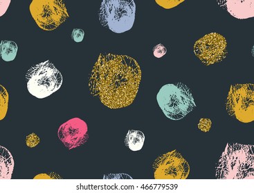 Vector seamless pattern with hand drawn gold glitter textured sponge polka dots. Dry brush. Black, gold, pink, green, white, red colors.