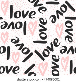 Vector seamless pattern with hand drawn LOVE lettering and hearts.