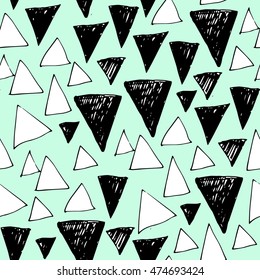 Vector seamless pattern with hand drawn triangles.