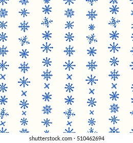 Vector seamless pattern with hand drawn snowflakes. Beautiful Christmas design, perfect for prints and patterns