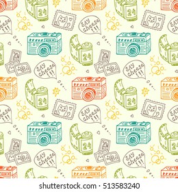 Vector Seamless Pattern with Hand Drawn Doodle Retro Photo Cameras