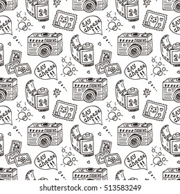 Vector Seamless Pattern with Hand Drawn Doodle Retro Photo Cameras