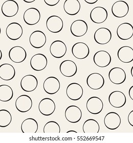 Vector seamless pattern. Hand drawn texture with rings. Stylish monochrome doodles. Modern graphic design. Hipster creative tileable print.