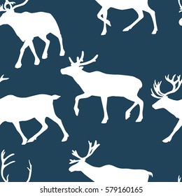 Vector seamless pattern with hand drawn reindeer silhouettes. Beautiful design elements, perfect for prints and patterns.