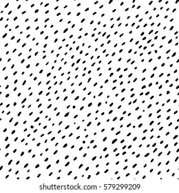 Vector seamless pattern. Hand drawn spots texture. Simple structure. Abstract background with many scattered pieces. Black and white design. Cute illustration for wallpaper, wrapping paper, textile.