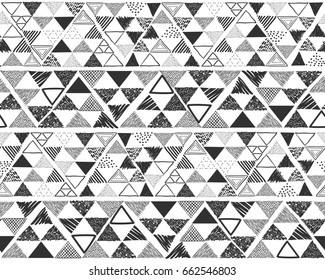 Vector seamless pattern. Hand drawn grayscale triangles on white background.