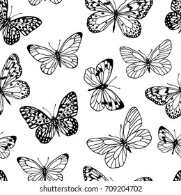 Vector seamless pattern with hand drawn cabbage butterflies. Ink drawing, graphic style. Beautiful design elements. Vintage style.
