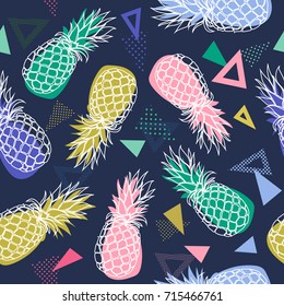 Vector seamless pattern with hand drawn pineapple fruits on colorful geometrical  background in Memphis style.Vector illustration for fabric, textile, wrapping paper and other decoration design.