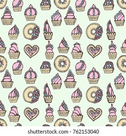 Vector seamless pattern with hand drawn delicious cupcakes and donuts.
