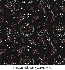 Vector seamless pattern with hand and moths. Moon. Mysticism. Wildlife. Hand drawn illustration. The print is used for Wallpaper, fabric, textile.