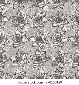 Vector seamless pattern of hand-drawn flowers on a background of curves