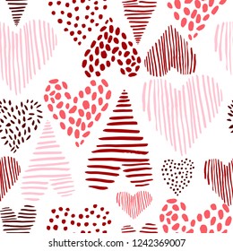 Vector seamless pattern with hand-drawn hearts. 