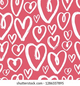 Vector seamless pattern with hand-drawn hearts. 