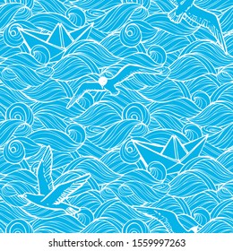 Vector seamless pattern with hand-drawn white stylized waves, flying seagulls and paper boats on a blue background.