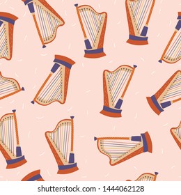 Vector seamless pattern with harps. Classical musical instruments. Warm colors. Isolated objects. 