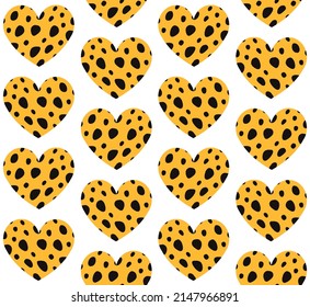 Vector seamless pattern of heart with cheetah fur prints isolated on white background