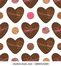 Vector seamless pattern with heart shaped box and chocolate candies. Brown color heart boxes with ribbon bow. Valentines Day background for wrapping paper, wrapper, packaging, fabric and print, etc.