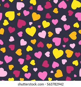 Vector seamless pattern with hearts. Background for St. Valentine's Day. Bright elements on black background.