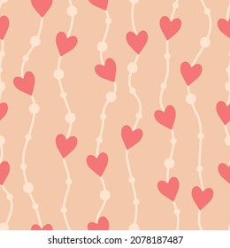 Vector seamless pattern with hearts. Cute design for fabric, wrapping, wallpaper for Valentine's Day.