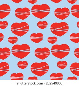 Vector seamless pattern with hearts on a blue background