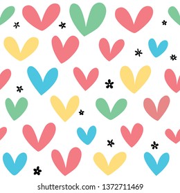 Vector seamless pattern with hearts in pastel colors.