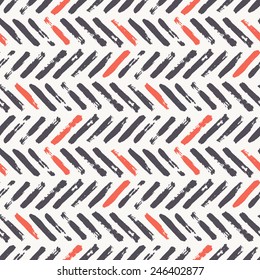 Vector seamless pattern of herringbone. Abstract background with brush strokes. Hand drawn texture with randomly color accents