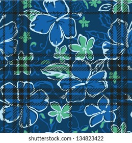 Vector seamless pattern with hibiscus and tartan plaid texture