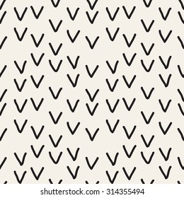 Vector seamless pattern. Hipster monochrome print with hand drawn chevron. Trendy graphic design.