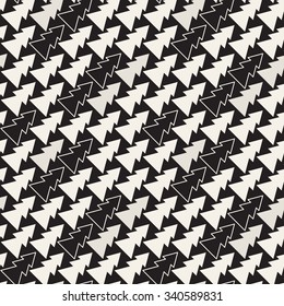 Vector seamless pattern. Holiday texture with diagonal Christmas trees. Stylish geometric print.