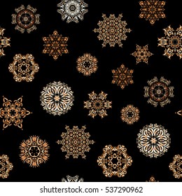 Vector seamless pattern for holiday Thanksgiving day, a simple hand-drawn winter design on black background in beige, brown and orange colors.